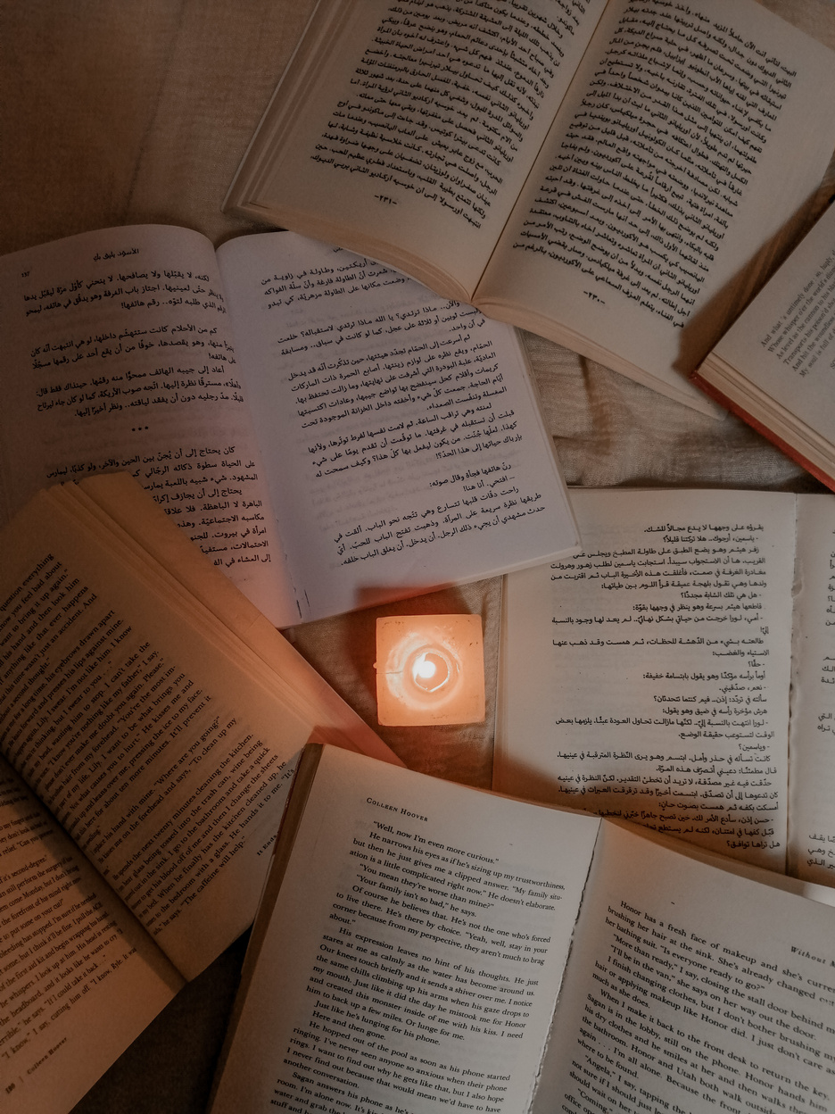 Candle near the Books